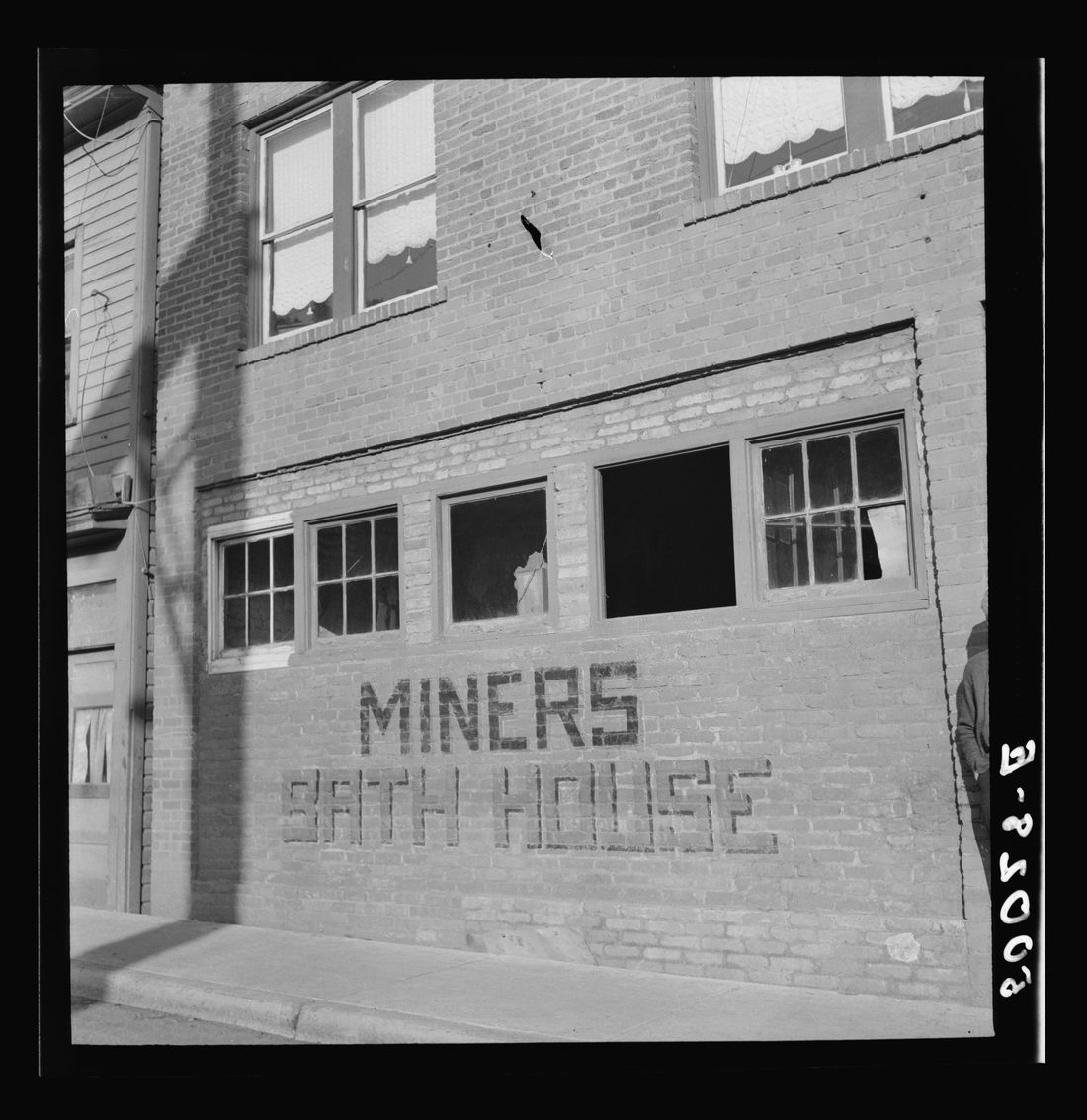 Public bath houses for miners in center of town in Welch. Bluefield section, West Virginia. Most miners' homes have no running water, and water must be carried a long distance