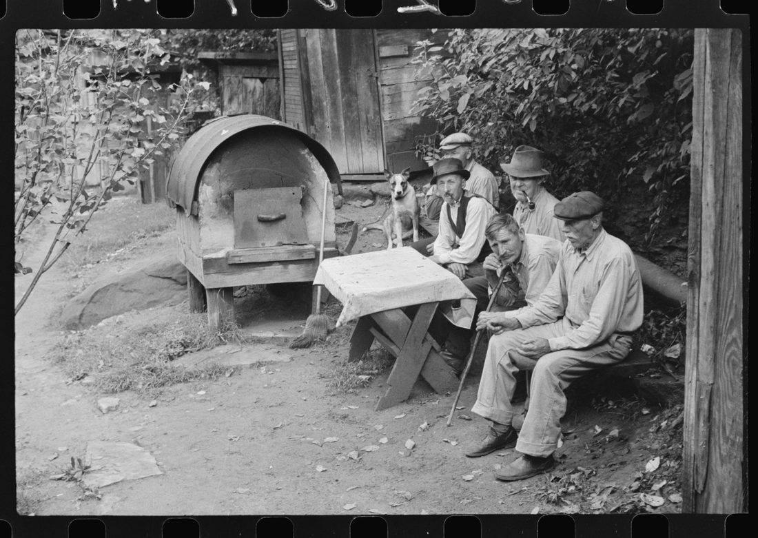 Bohemian miners (coal loaders) unemployed since mechanization of mines. Jere, West Virginia. They live together in one house with a woman housekeeper. All on relief. Spend most of 