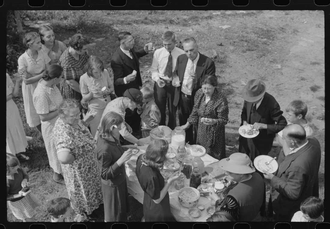 Sunday school picnic. Much of the food brought into abandoned mining town of Jere, West Virginia by "neighboring folk" from other parishes. There is a great deal of &quot