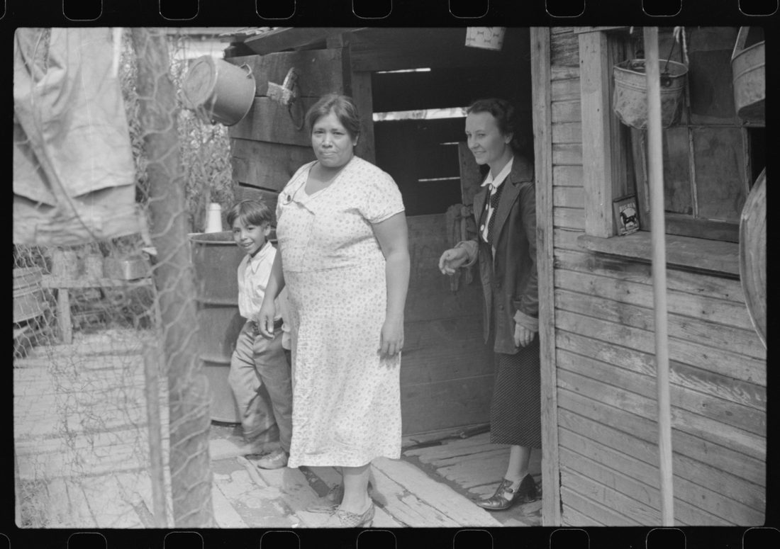 Mexican miner's wife and child are visited by another miner's wife (Hungarian) who is interested in starting a maternal health clinic there. Scotts Run, Bertha Hill, West