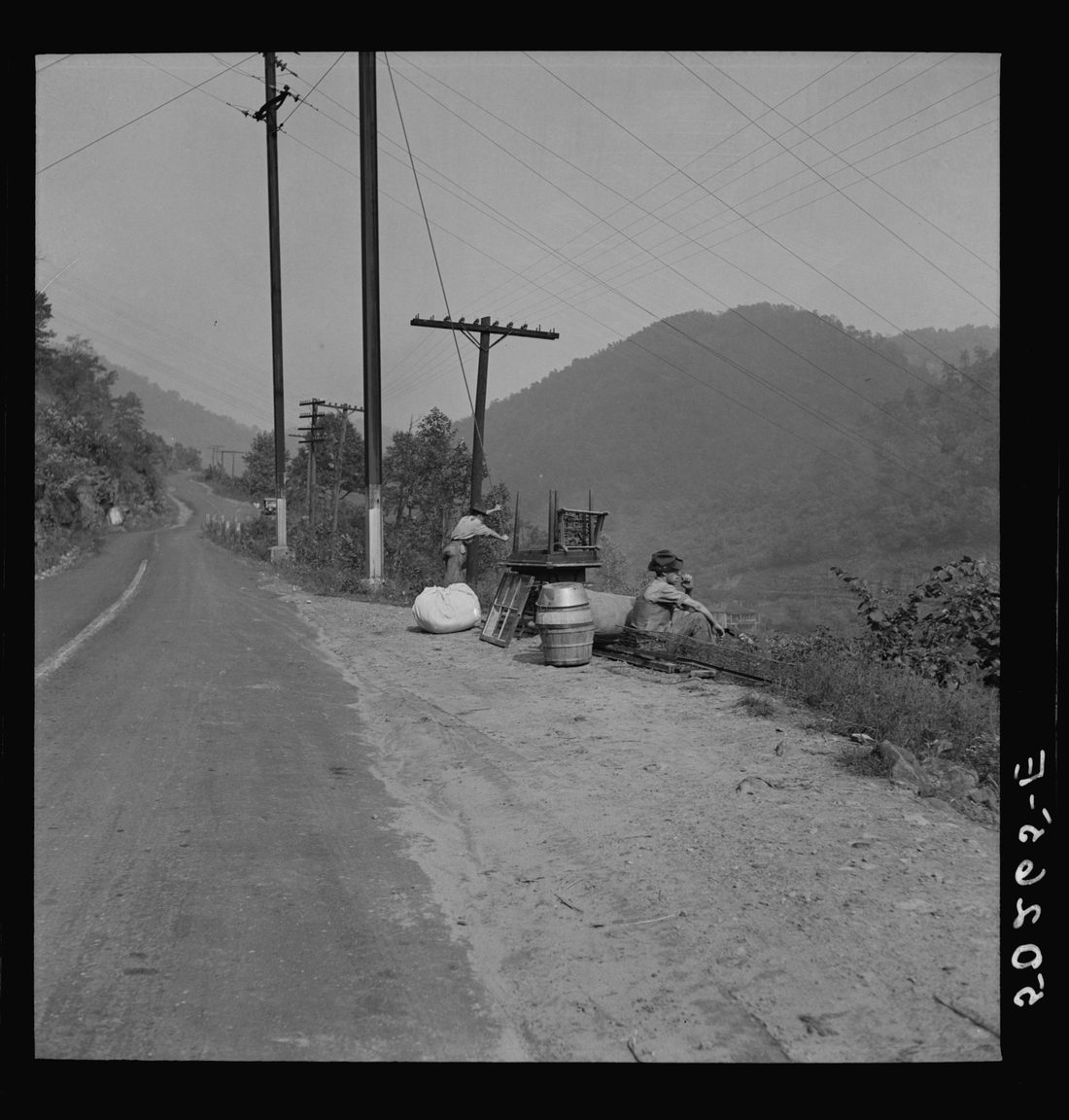 Places to live being very scarce, miners must sometimes wait on main country roads for help from others with all their belongings. No job, no home. Mohegan, West Virginia