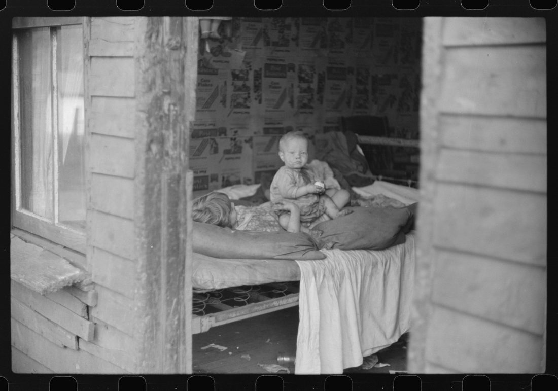 Children in bedroom of their home. Mother has TB, father is on WPA (Works Progress Administration), Charleston, West Virginia