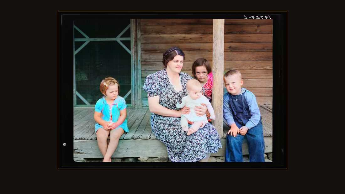 Wife and children of tobacco sharecropper on front porch. Person County, North Carolina