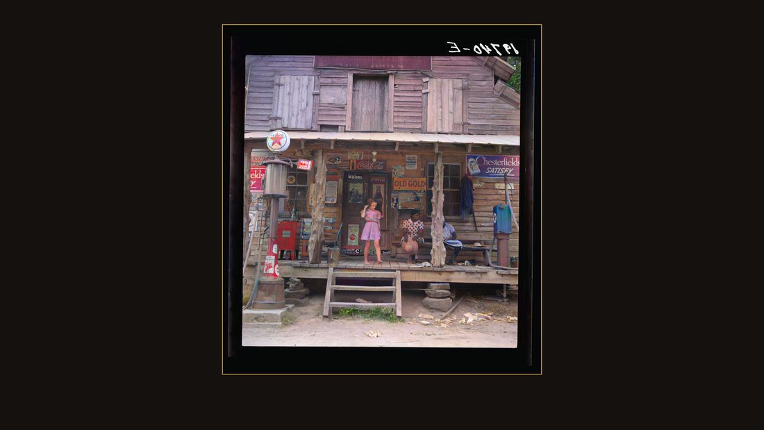Daughter of white tobacco sharecropper at country store. Person County, North Carolina