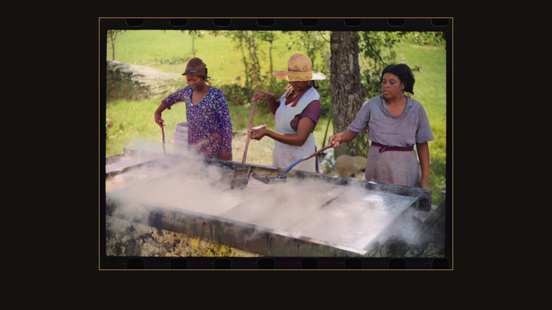 Skimming the boiling cane juice to make sorghum syrup at cane mill near Carr, Orange County, North Carolina
