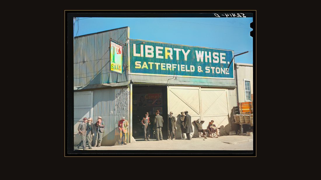 Outside tobacco warehouse during auction sale. Durham, North Carolina