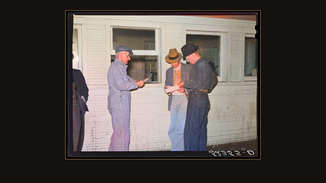 Farmers getting their checks after sale of tobacco at auction in warehose. Durham, North Carolina