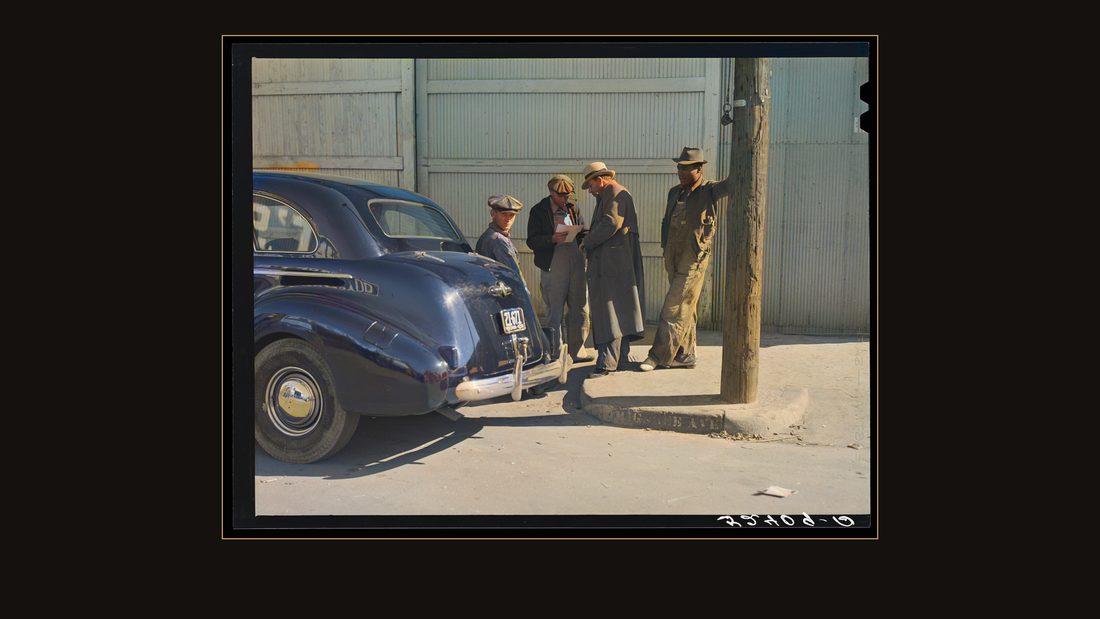 Farmers looking at their checks outside tobacco warehouse after auction sales. Durham, North Carolina