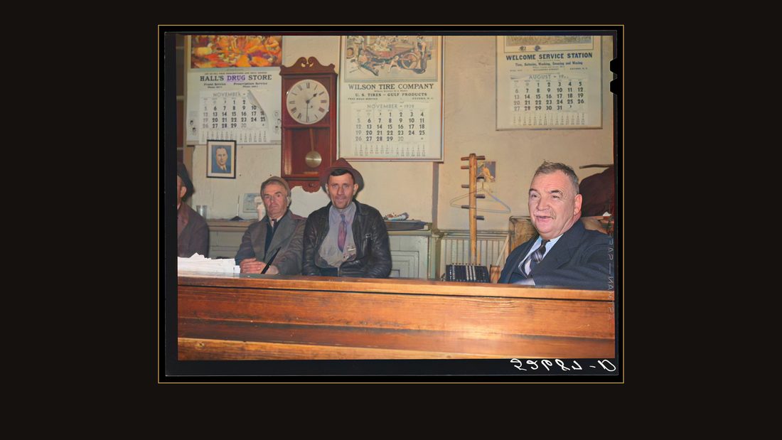 Sheriff Graham and two farmers killing time during dinner hour in his office on court day in Granville County Courthouse. Oxford, North Carolina