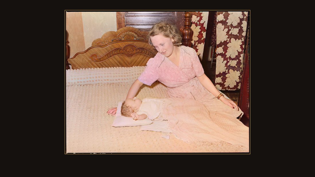Mrs. Carl Ruth and her baby. Black Mountain Corporation, 30-31 Mines, Kenvir, Harlan County, Kentucky.