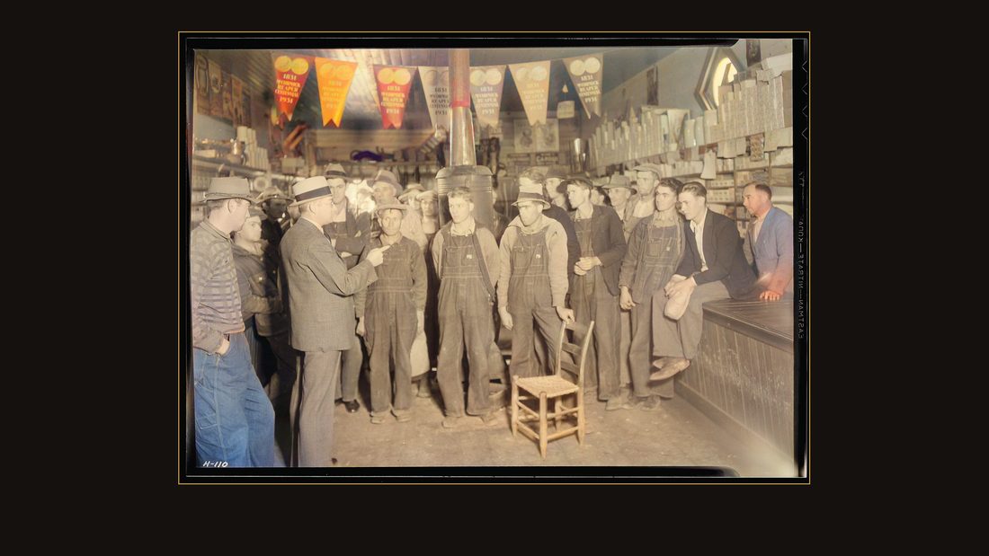 "E. H. Elam, interviewer from the Personnel Division, TVA, conferring with residents of the neighborhood at Stiner's store, Lead Mine Bend, Union County, Tennessee, and e