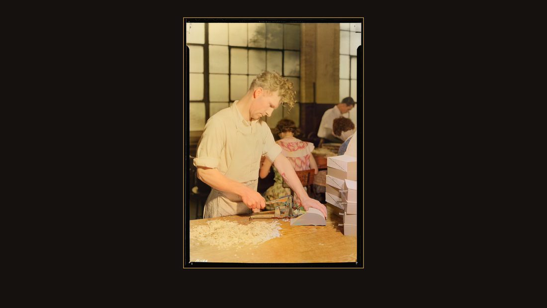 "Gaines McGlothin, R. F. D. #2, Kingsport, Tennessee. McGlothin is here shown cutting index tabs in the process of indexing a book. This is a medium-skilled operation, requiri