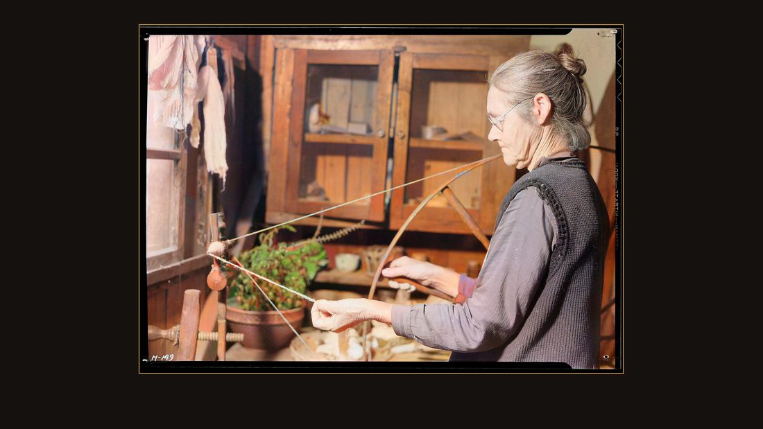 "Mrs. James Watson in her mountain cabin near Gatlinburg, Tennessee. (P.O. Sevierville-Star Route). Mrs. Watson is 65 years old and spins wool yarn for the weavers at the Pi B