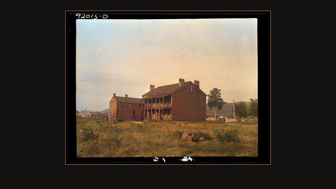 Eleanor, West Virginia. Rear view of administration building at Red House after which Red House Farms was named. The "Red House" was built of brick prior to 1825 by Josep