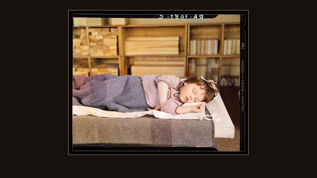 Child sleeping in nursery school. Reedsville, West Virginia