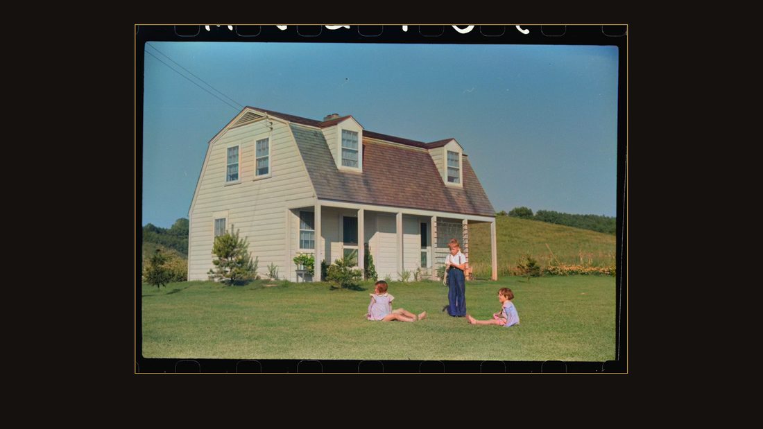 Children of homesteaders playing on their front lawn, Tygart Valley, West Virginia
