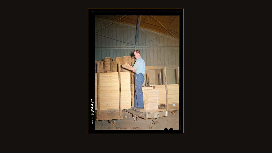 Checker at dimension lumber mill. This mill affords employment to a great many of the men and older boys living on the project. It is located near the project shopping center. Dail