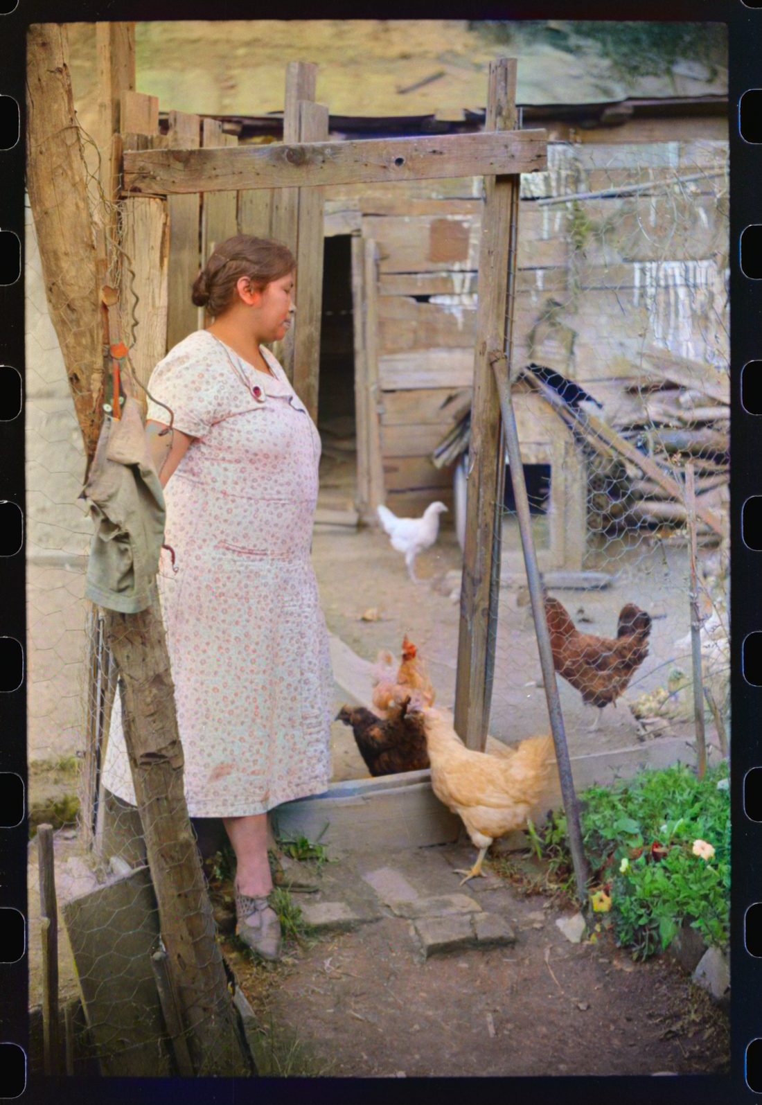 [Untitled photo, possibly related to: Mexican miner's wife and child are visited by another miner's wife (Hungarian) who is interested in starting a maternal health clini