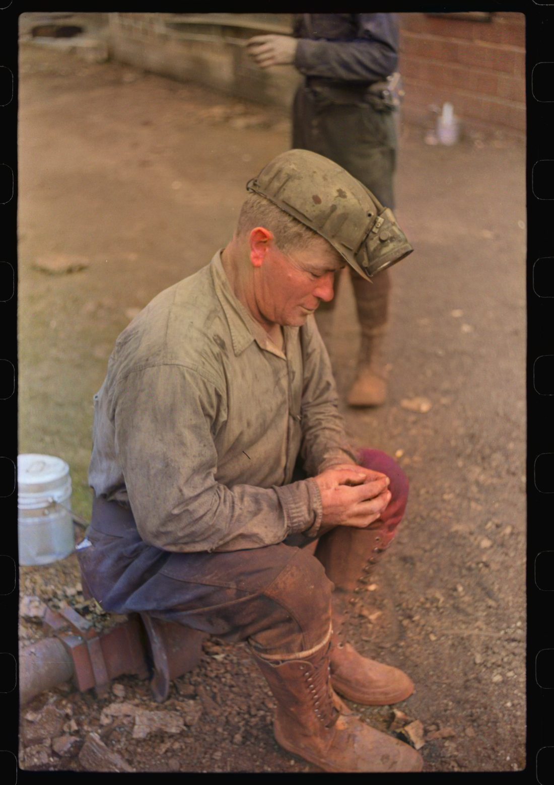 Coal miner waiting for the next shift, Bertha Hill, Scotts Run, West Virginia