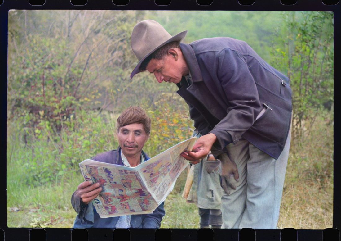 Mexican miners looking at "funny papers." Bertha Hill, Scotts Run, West Virginia