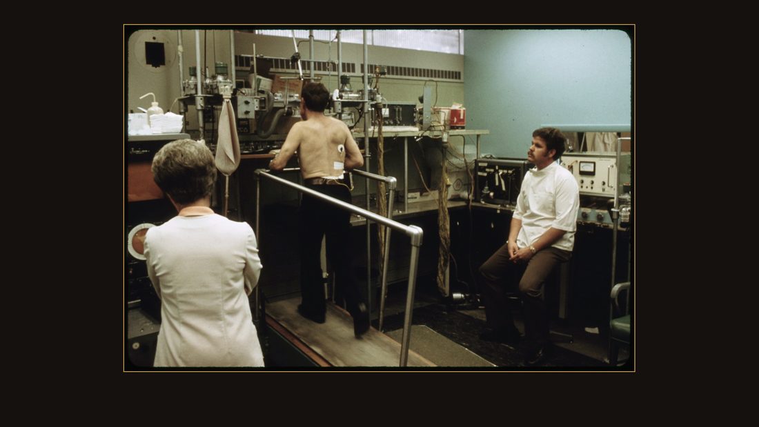 MINER IN THE BLACK LUNG LABORATORY AT THE APPALACHIAN REGIONAL HOSPITAL IN BECKLEY, WEST VIRGINIA, UNDERGOING TESTS WHILE ON A TREADMILL. HIS LUNG CAPACITY AND HEARTBEAT ARE MONITO