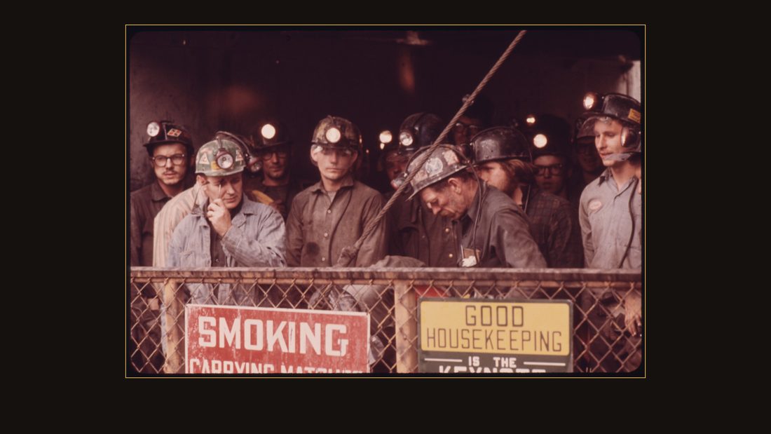 SHIFT OF MINERS IN THE ELEVATOR WHICH WILL TAKE THEM DOWN TO WORK IN THE VIRGINIA-POCAHONTAS MINE #4 NEAR RICHLANDS, VIRGINIA THEY ARE HEADED FOR THE 1,200 FOOT LEVEL. THE BLACK HA