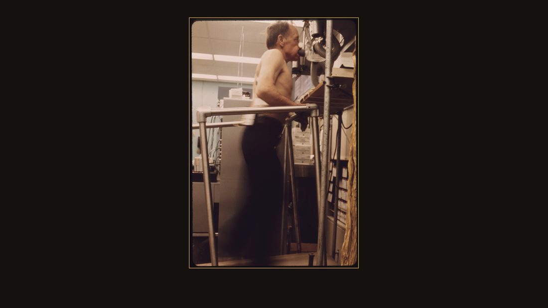 MINER IS HOOKED UP TO A BREATH MACHINE TO MONITOR HOW MUCH LUNG CAPACITY HE HAS WHILE WALKING ON A TREADMILL DURING TESTS AT THE BLACK LUNG LABORATORY AT THE APPALACHIAN REGIONAL H