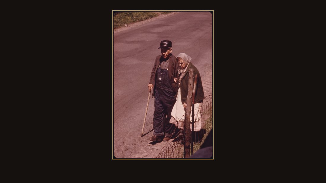 J.L. BOLEN, 74, A BLIND, RETIRED COAL MINER IS ACCOMPANIED ON A WALK FOR FRESH AIR BY HIS WIFE IN BESOCO, WEST VIRGINIA, NEAR BECKLEY HE ALSO LIKES TO WALK AT NIGHT. BOLEN WAS BORN