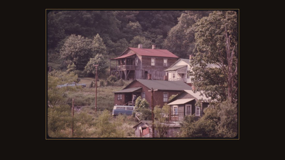 HOUSES IN BESOCO, WEST VIRGINIA, NEAR BECKLEY. THEIR CONDITION MIRRORS THE DECLINE OF THE ONCE BUSY MINING TOWN. THE MINES ARE NO LONGER WORKED THERE. THE PEOPLE WHO REMAIN BEHIND