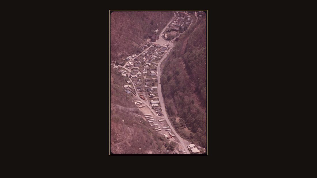 AERIAL VIEW OF CHATTAROY, WEST VIRGINIA, NEAR WILLIAMSON SHOWING THE SCHOOL NEAR THE TOP OF THE PICTURE. THERE IS NO INDUSTRY IN THE TOWN. MOST OF THE PEOPLE SURVIVE ON WELFARE, PE