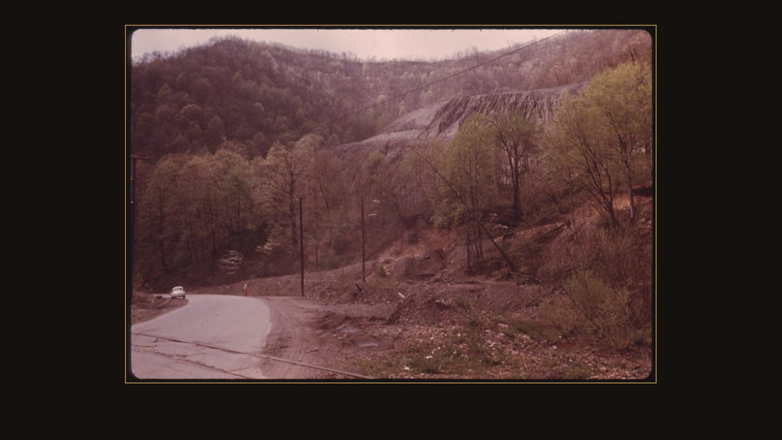 SLAG HEAP ON BUFFALO CREEK NEAR MAN AND LOGAN, WEST VIRGINIA. AN EARTHEN DAM GAVE WAY ON THIS STREAM IN THE EARLY 1970'S DURING A RAINSTORM CREATING A TIDAL WAVE OF FLOOD WATE