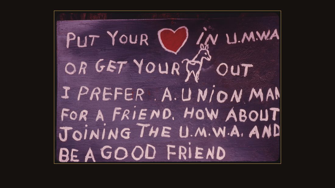 CLOSEUP OF A PICKET SIGN MADE BY MINERS ON STRIKE AGAINST THE BROOKSIDE MINE COMPANY IN BROOKSIDE, KENTUCKY, NEAR MIDDLESBORO IN THE SOUTHEAST PART OF THE STATE. VIOLENCE OCCURRED
