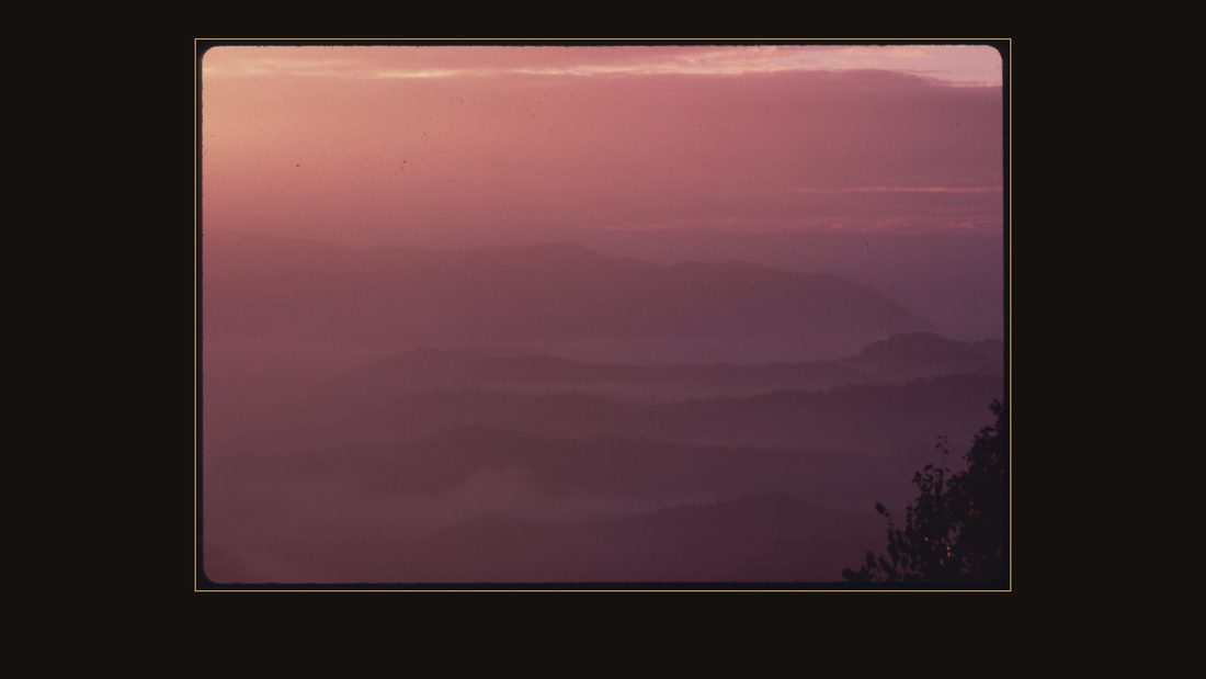 SUNRISE OVER BLACK MOUNTAIN WHICH SEPARATES VIRGINIA AND KENTUCKY, NEAR KINGSPORT, TENNESSEE. NEAR HARLAN COUNTY, KENTUCKY THIS AREA HOLDS SOME OF THE RICHEST COAL RESERVES IN THE