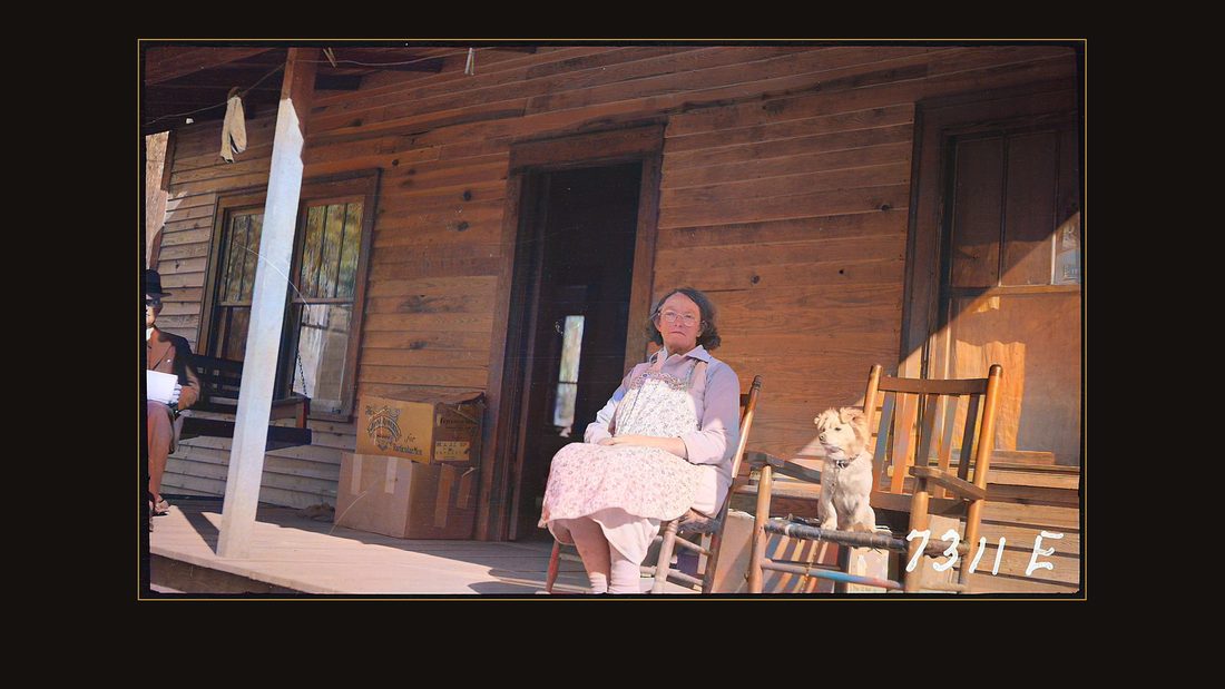Rose, Eliza; sitting on front porch