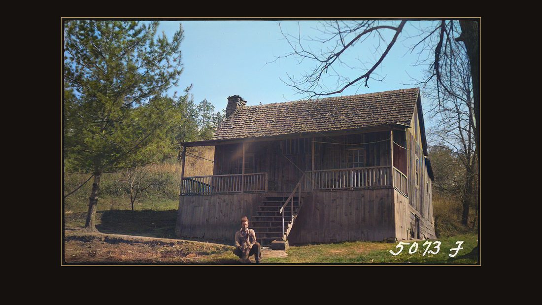 Rogers, J.A.; in front of his home