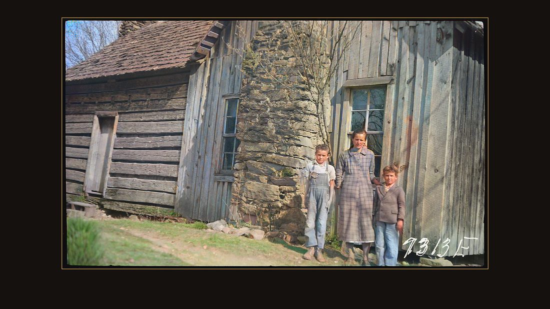 Hogshed, P.C.; wife and children in front of home