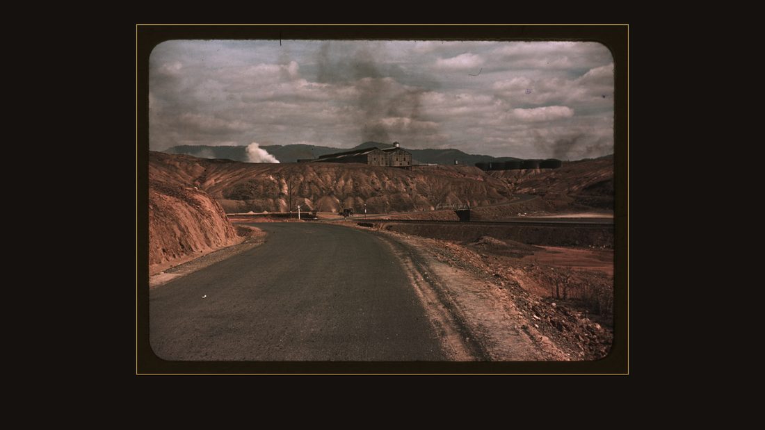 A train bringing copper ore out of the mine, Ducktown, Tenn. Fumes from smelting copper for sulfuric acid have destroyed all vegetation